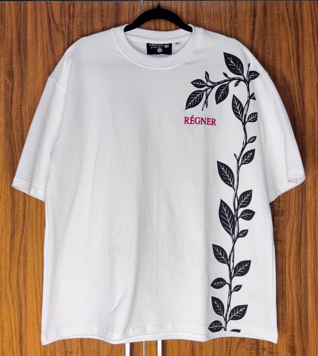 RÉGNER The Butterfly T-shirt showing embroidered butterfly artwork with raised blue puff detail